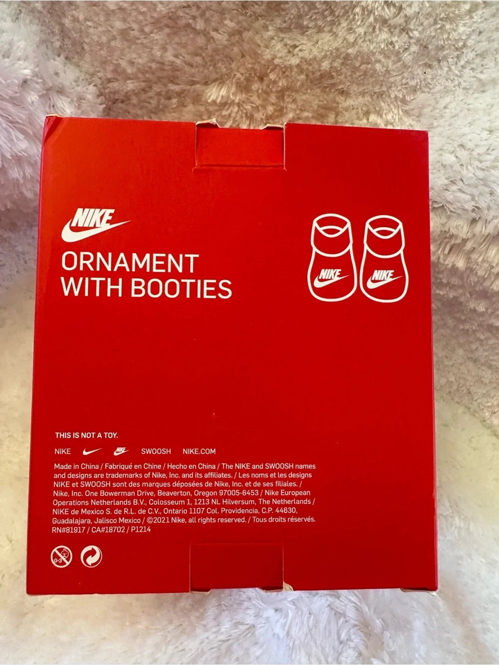 Nike Ornament with Baby Booties